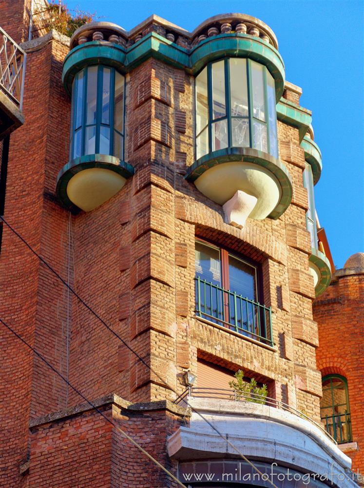 Milan (Italy) - Balcony and bow windows of Fidia Palace in the Quadrilateral of Silence